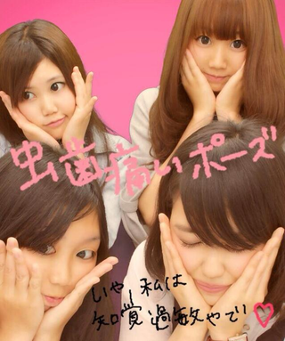 Illustration for article titled Japanese Photo Trend: Pretend Toothaches